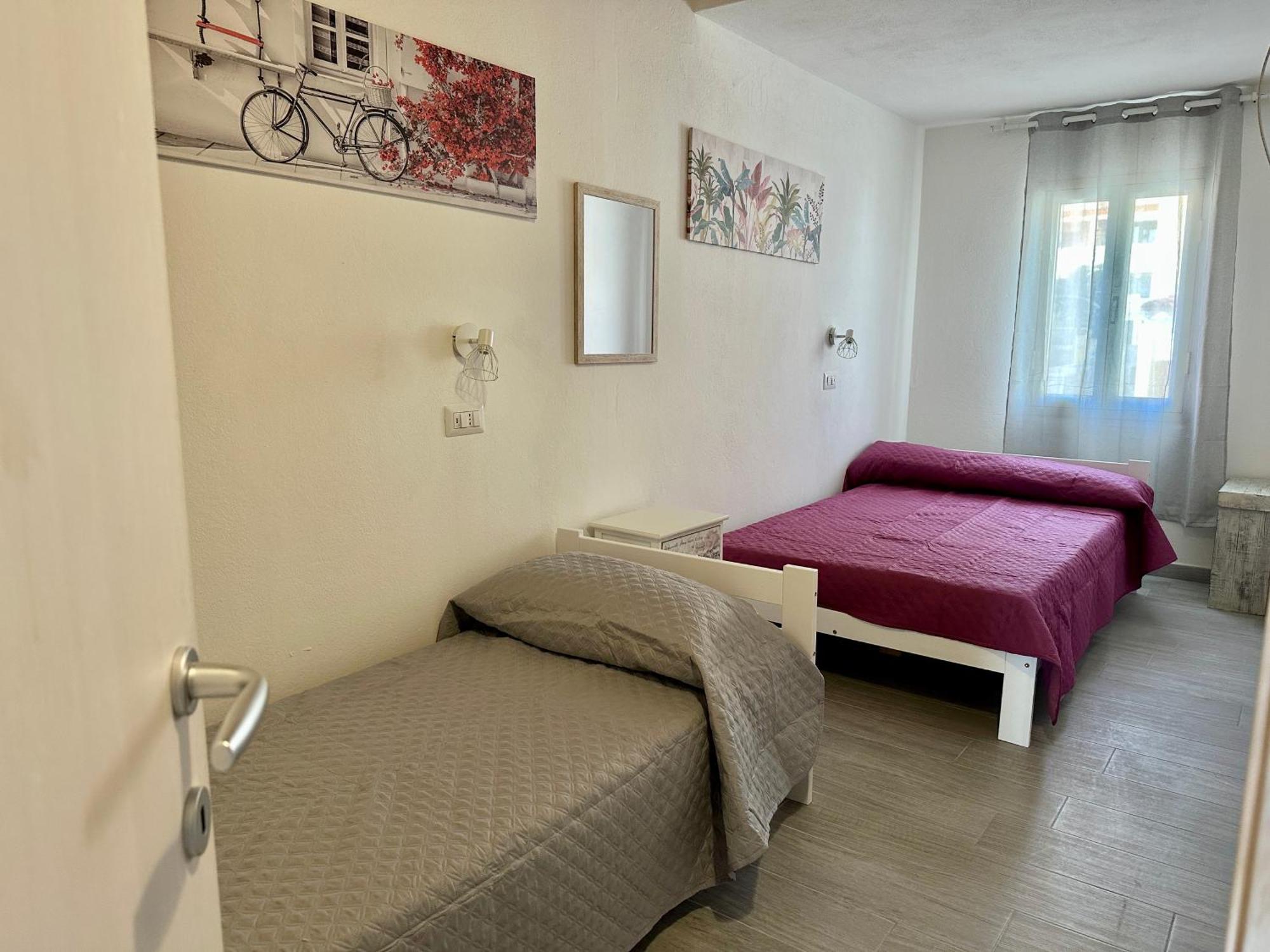 Approdo Apartments Isola Rossa Extérieur photo