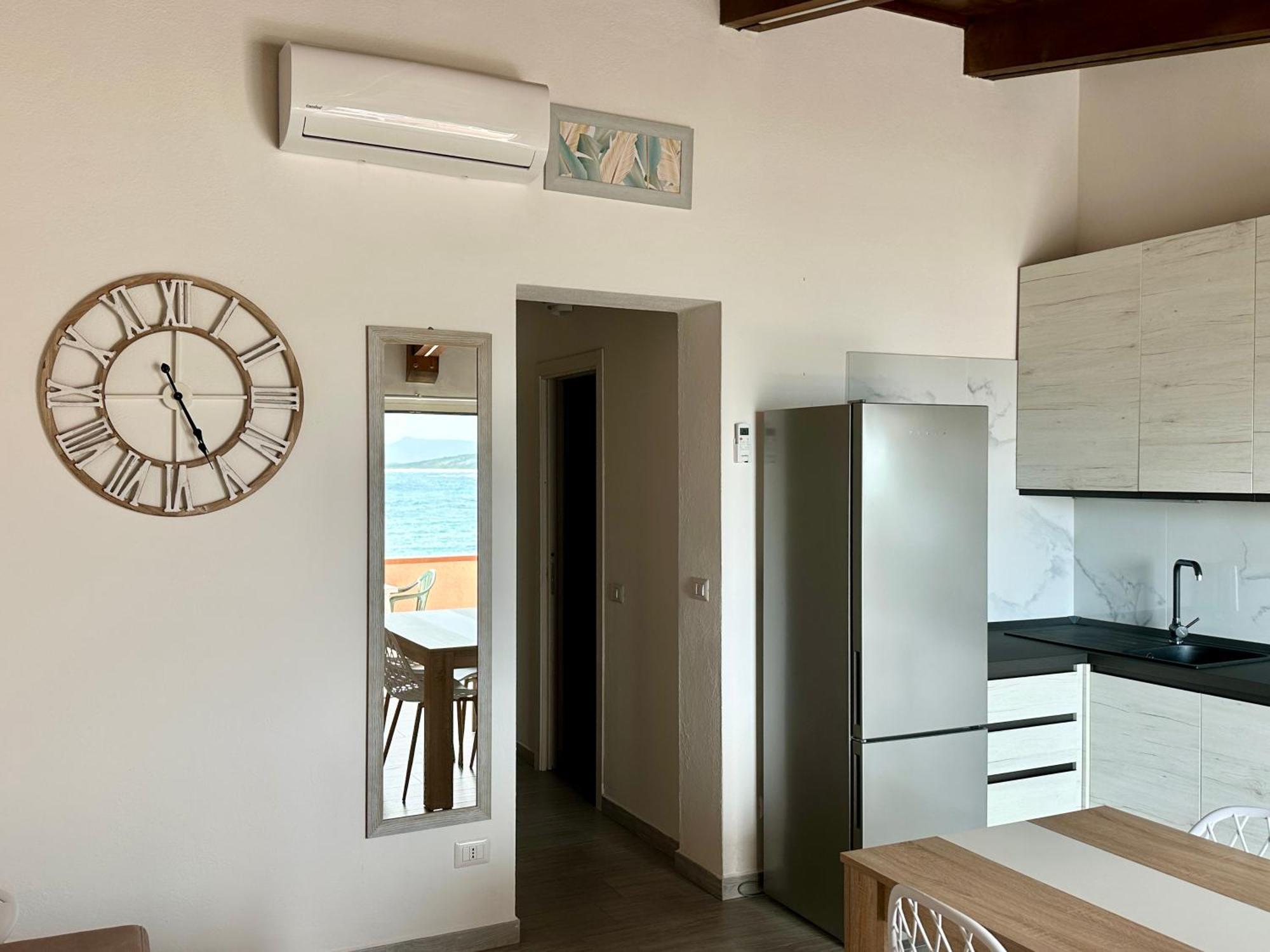 Approdo Apartments Isola Rossa Extérieur photo