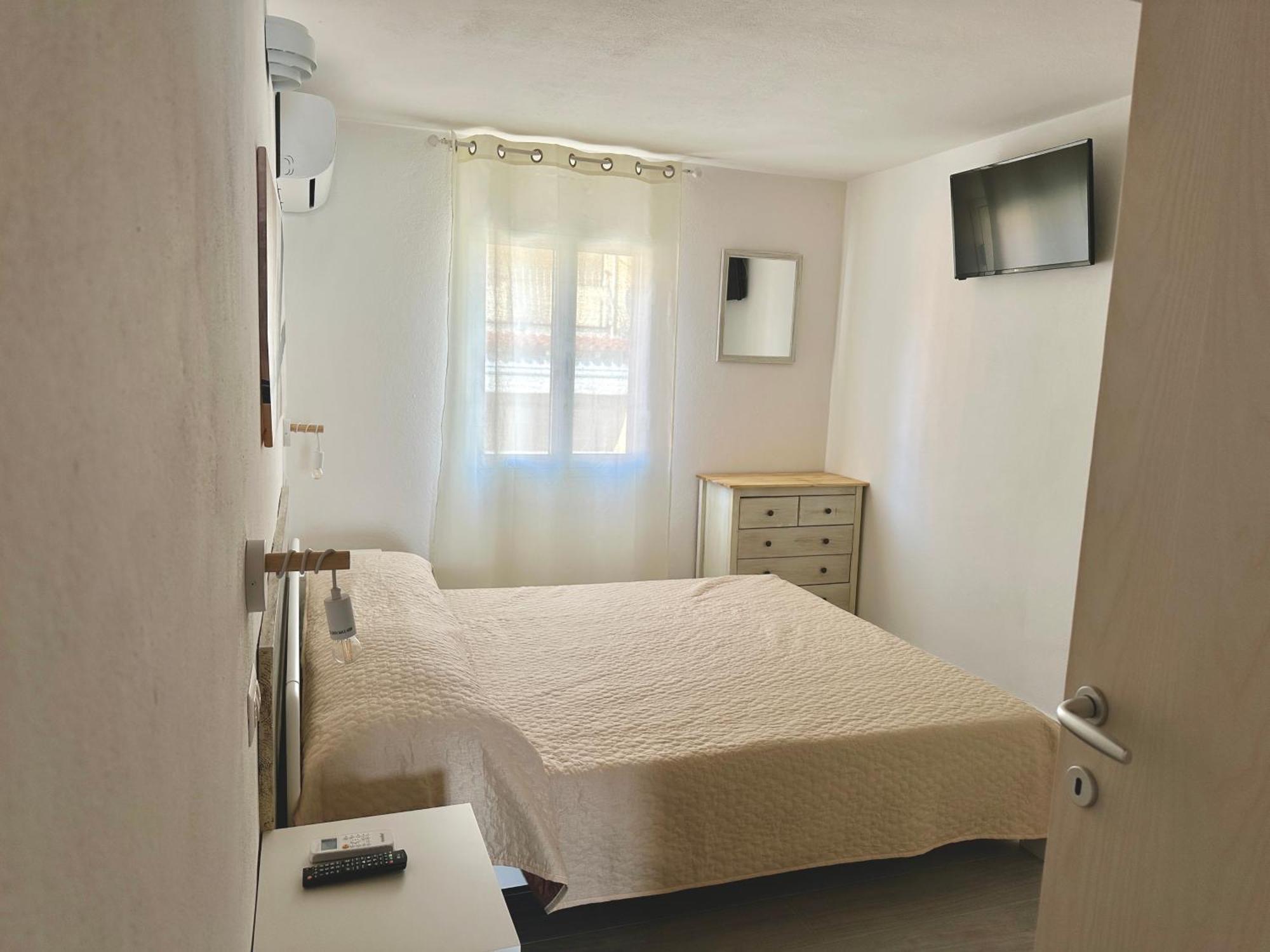 Approdo Apartments Isola Rossa Extérieur photo
