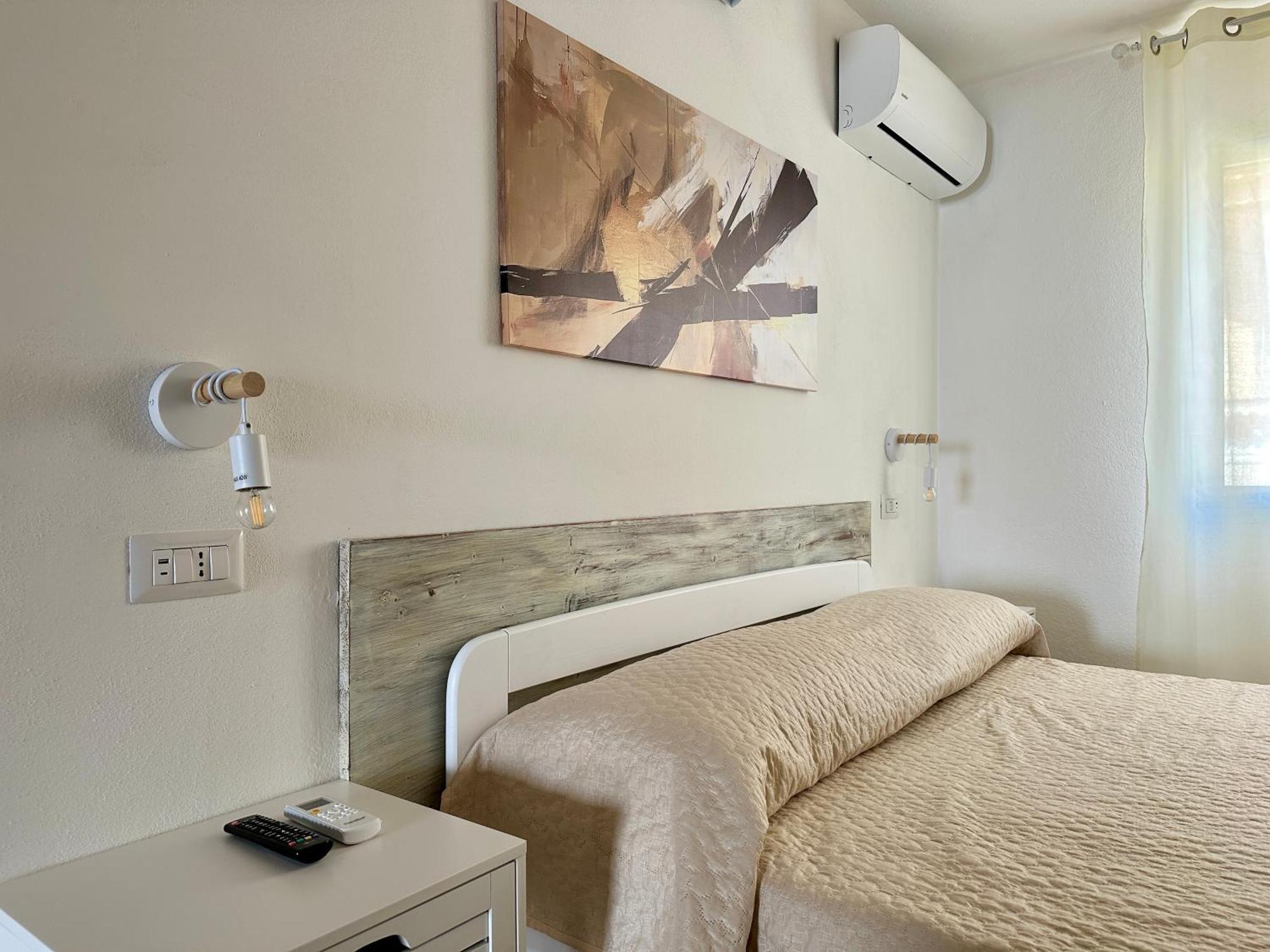Approdo Apartments Isola Rossa Extérieur photo