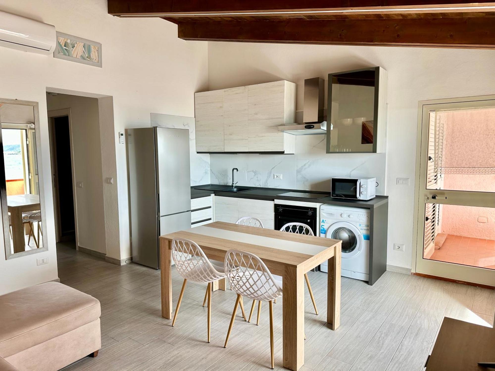 Approdo Apartments Isola Rossa Extérieur photo